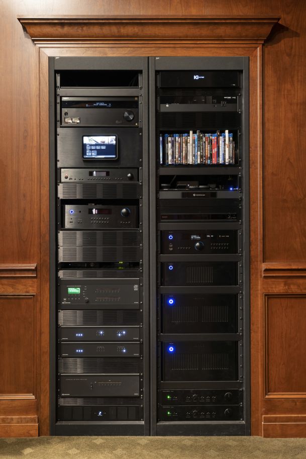 Equipment rack with amplifiers, receivers, and media components