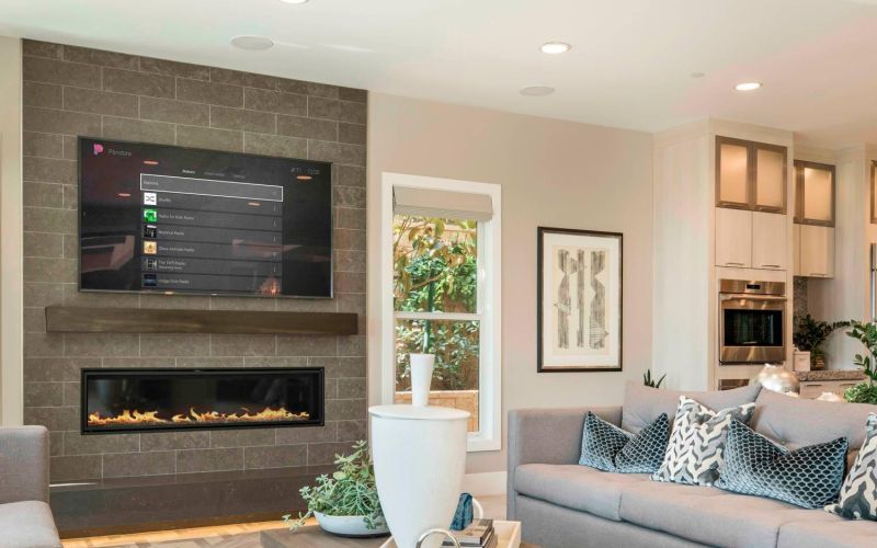 family room with white couch and TV