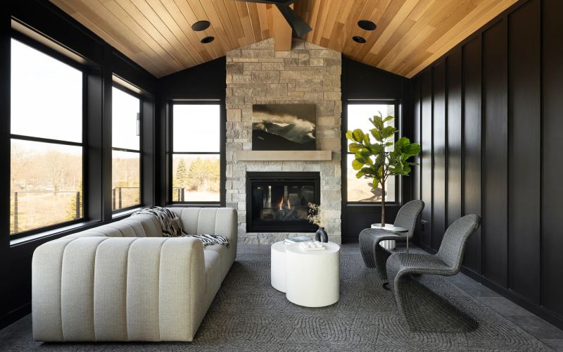 family room with white couch and TV